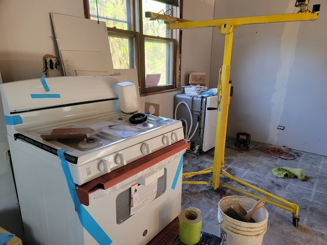 kitchen with white gas range