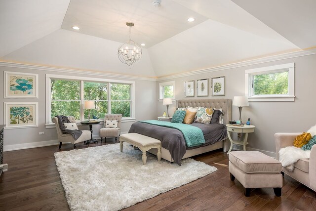 bedroom with an inviting chandelier, lofted ceiling, and dark wood-type flooring