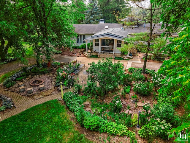 view of yard with a sunroom