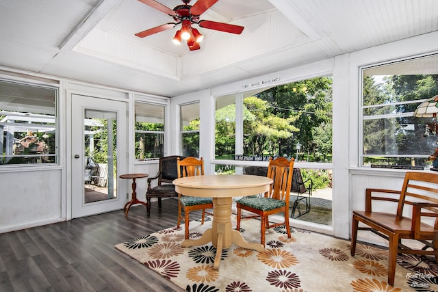 sunroom / solarium featuring ceiling fan and plenty of natural light