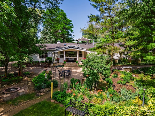 rear view of property with a gazebo