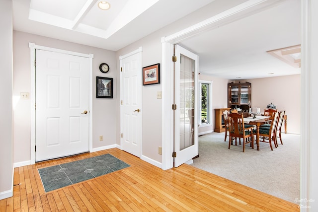 view of carpeted foyer