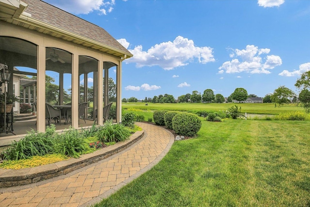 3001 E Stone Creek Blvd, Urbana, IL 61802 - view of grassy yard featuring a sunroom