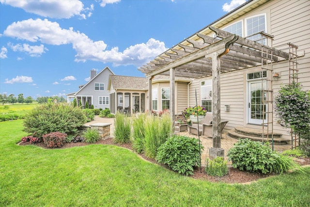 3001 E Stone Creek Blvd, Urbana, IL 61802 - rear view of house with a pergola, a lawn, and a patio