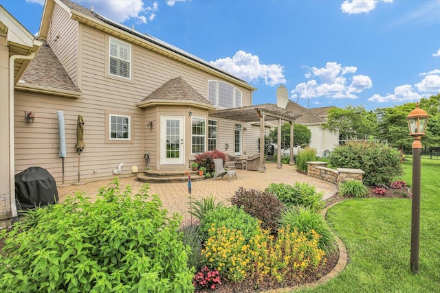 3001 E Stone Creek Blvd, Urbana, IL 61802 - back of property with a pergola, a patio, a lawn, an outdoor hangout area, and roof with shingles
