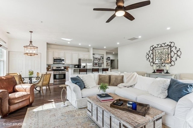 33 Johnson Ct Unit 0, North Aurora, IL 60542 - living area with wood finished floors, a chandelier, ceiling fan, and recessed lighting