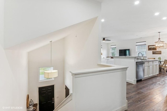 33 Johnson Ct Unit 0, North Aurora, IL 60542 - kitchen with stainless steel dishwasher, open floor plan, recessed lighting, dark wood-style flooring, and light countertops