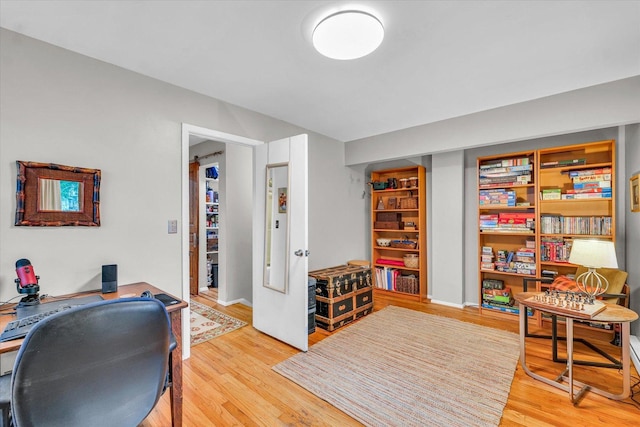 home office featuring light wood-type flooring