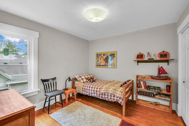 bedroom with light wood-style flooring
