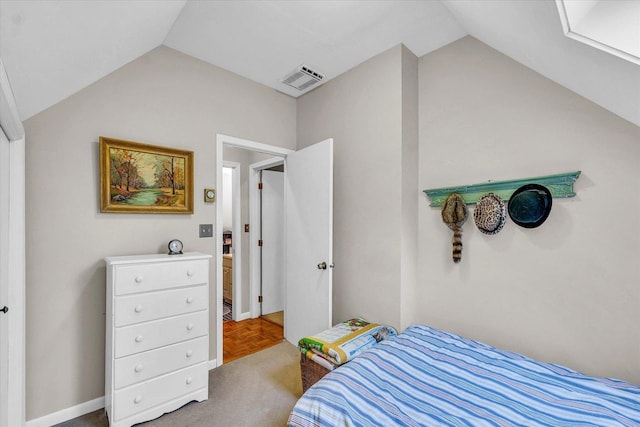 bedroom featuring lofted ceiling