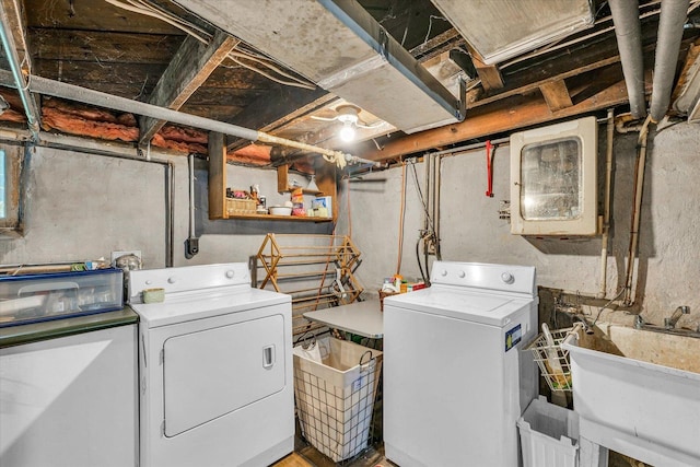 laundry room with washer and dryer