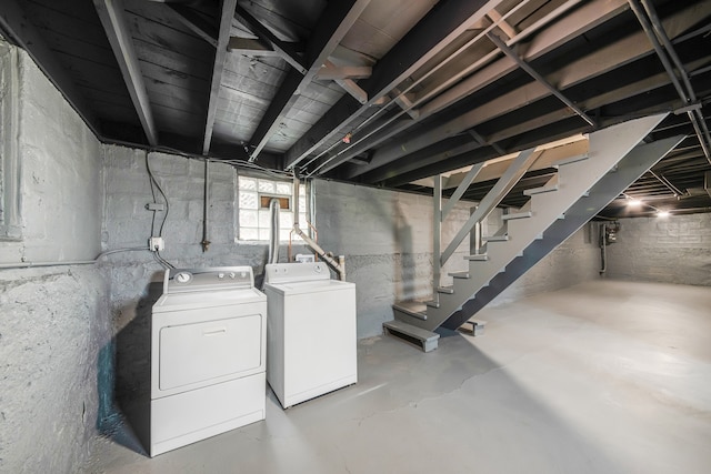 basement with washing machine and dryer