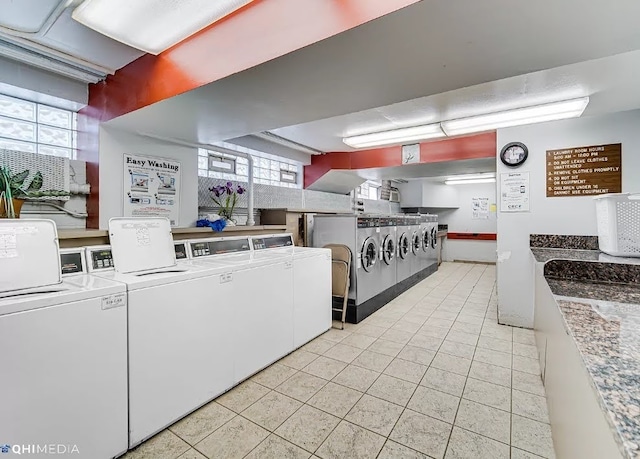 interior space with washer and clothes dryer