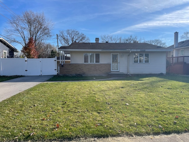 single story home with a front yard