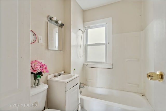 full bathroom with bathing tub / shower combination, toilet, and vanity