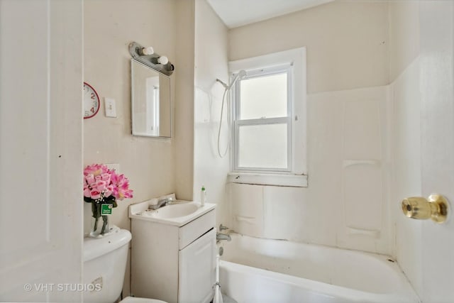 full bathroom with vanity, tub / shower combination, and toilet