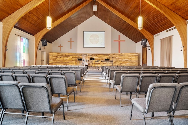 interior space featuring wood ceiling and high vaulted ceiling