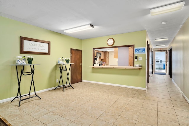 interior space featuring light tile floors