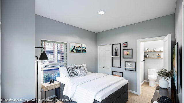 bedroom featuring ensuite bathroom and a closet