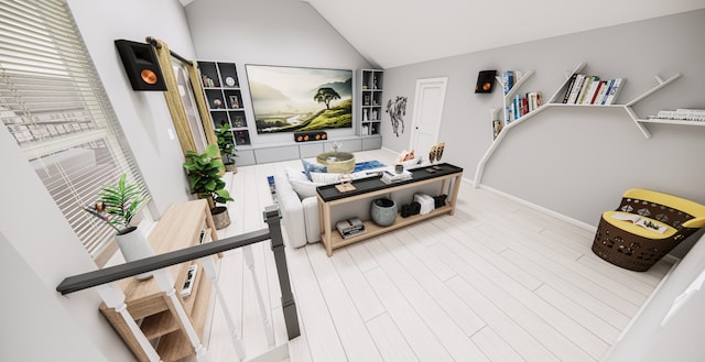 interior space featuring hardwood / wood-style flooring and vaulted ceiling