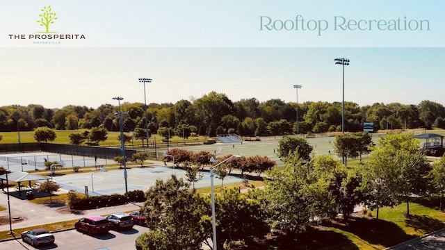 view of property's community featuring basketball court