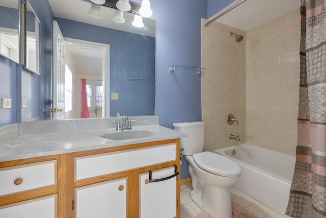 full bathroom featuring shower / tub combo with curtain, toilet, vanity, and tile patterned floors