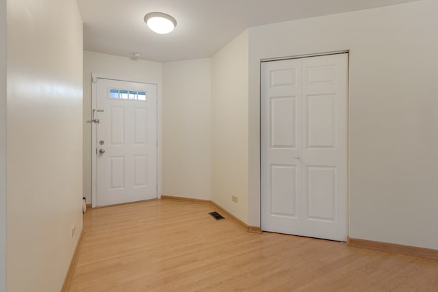 entrance foyer with light hardwood / wood-style floors