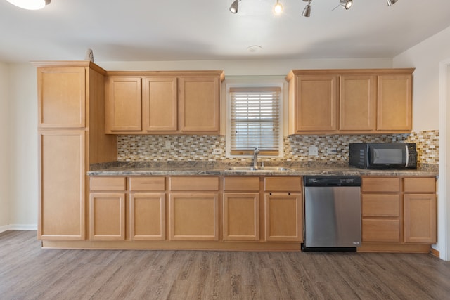 kitchen featuring sink, light hardwood / wood-style flooring, backsplash, and dishwasher