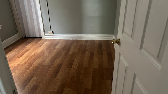 unfurnished room featuring hardwood / wood-style floors