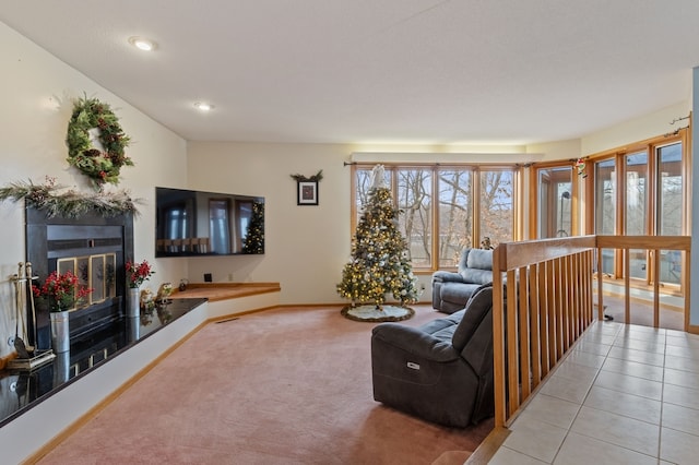 living room featuring light carpet