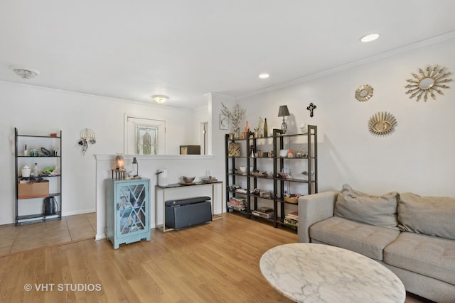 tiled living room featuring crown molding