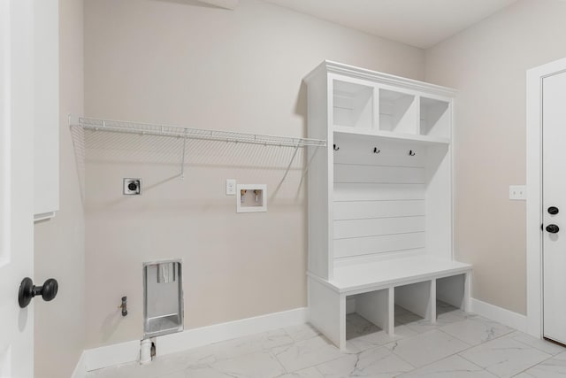 washroom featuring electric dryer hookup, hookup for a washing machine, light tile patterned flooring, and hookup for a gas dryer