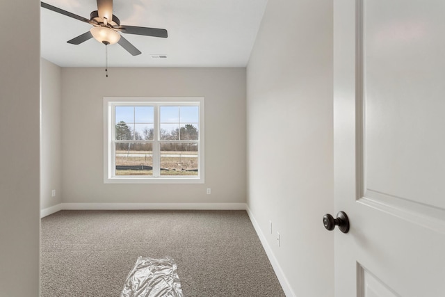 carpeted empty room with ceiling fan