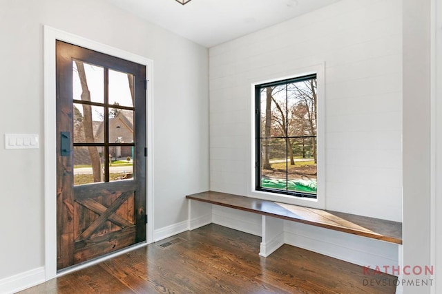 interior space with dark wood-type flooring