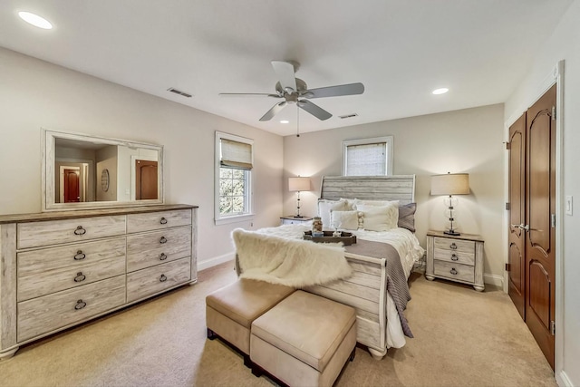 carpeted bedroom featuring ceiling fan