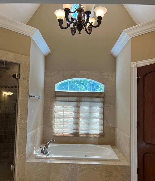 bathroom featuring a chandelier, lofted ceiling, and shower with separate bathtub