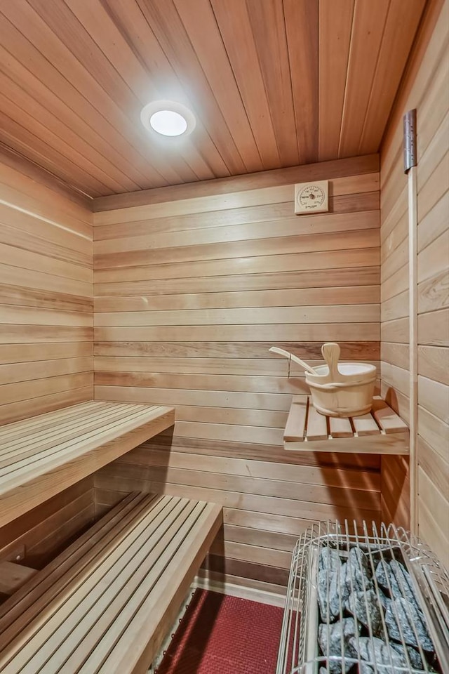 view of sauna / steam room with wooden ceiling