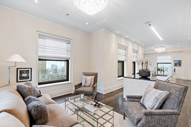 159 E Walton Pl Unit Ph, Chicago, IL 60611 - living area with a chandelier, dark wood-style flooring, recessed lighting, baseboards, and crown molding