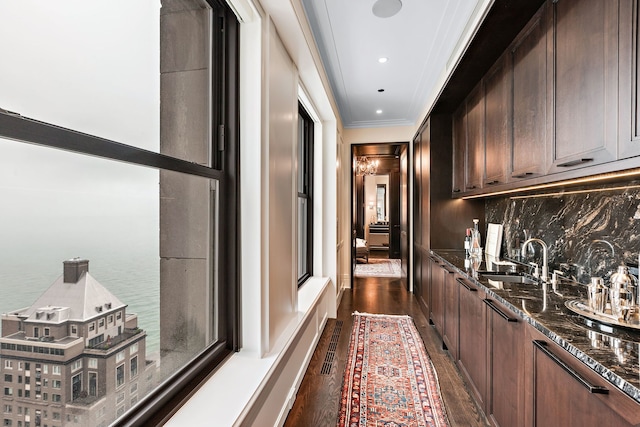 159 E Walton Pl Unit Ph, Chicago, IL 60611 - hallway featuring a sink, dark wood finished floors, and ornamental molding