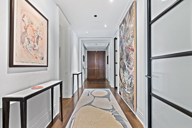 hallway with recessed lighting and dark wood-style flooring