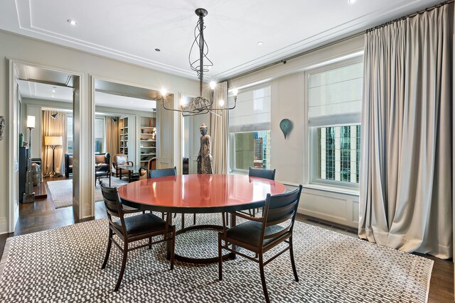 dining area featuring dark wood-style flooring