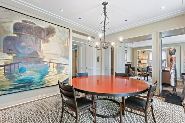 dining room featuring a notable chandelier and recessed lighting