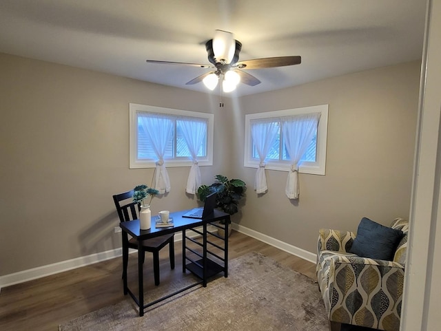 office area with hardwood / wood-style flooring and ceiling fan