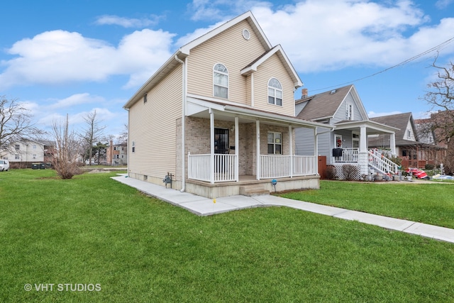 view of front facade with a porch and a front yard