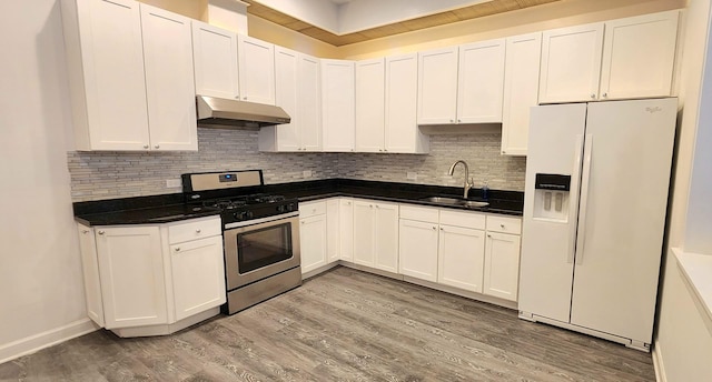 kitchen with gas stove, white cabinetry, sink, light hardwood / wood-style flooring, and white refrigerator with ice dispenser