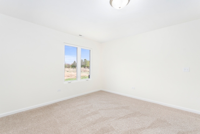 spare room with carpet flooring