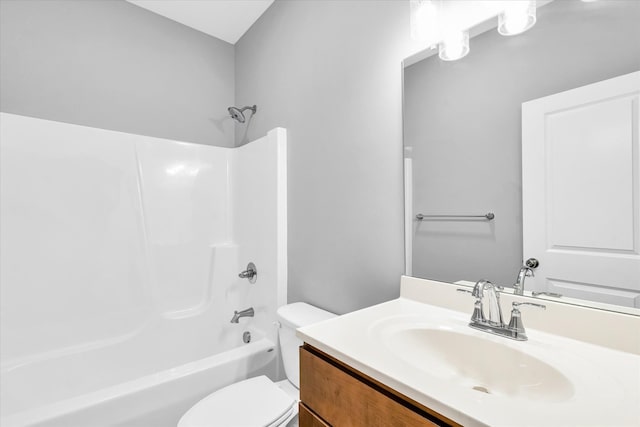 full bathroom with shower / tub combination, vanity, and toilet