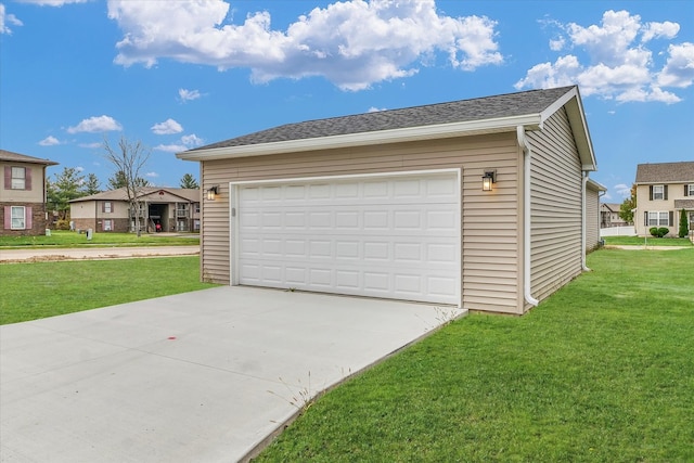 garage with a lawn