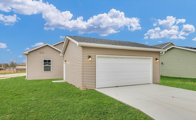 garage with a yard