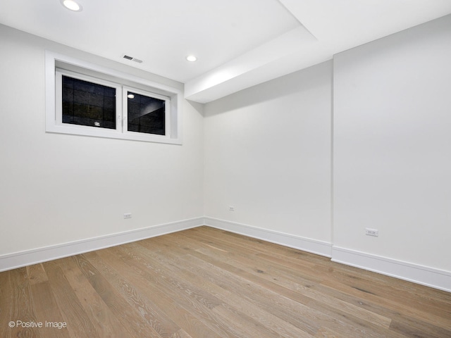 unfurnished room featuring light hardwood / wood-style flooring